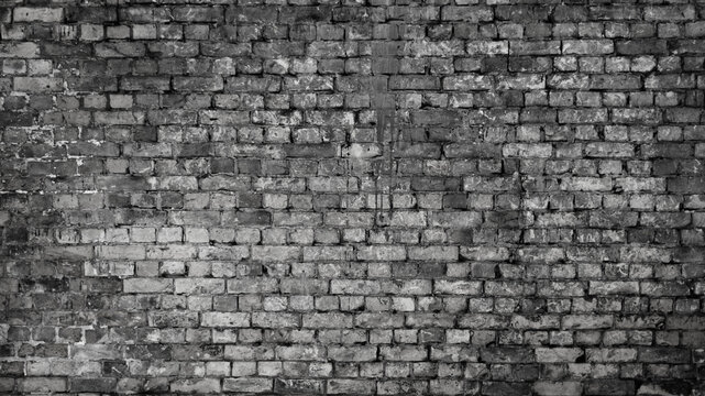 Fototapeta The photo shows a close-up of a grey brick wall