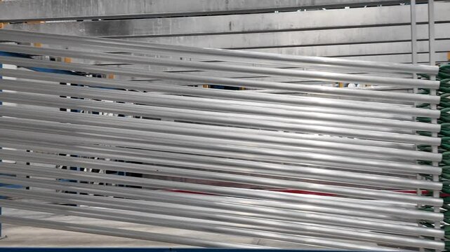 Aluminum profiles in industrial factory. Heavy industry