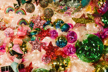 A Christmas tree with many colorful balls and a star