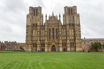 Fototapeta premium Wells cathedral is set in the medieval heart of England's smallest city and formally the Cathedral Church of St. Andrew, Somerset England.