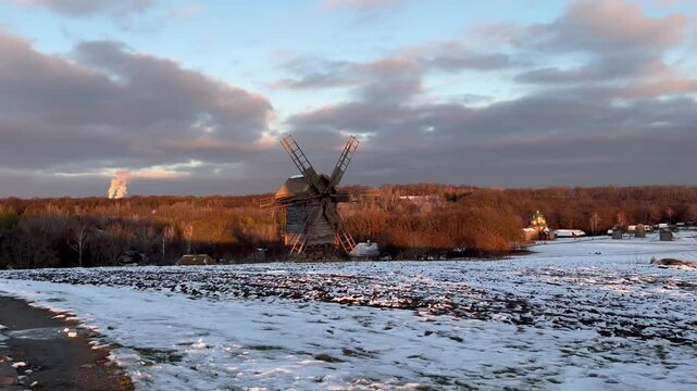 Winter landscape in an old village. The Pyrohiv Historical Museum in Kyiv, Ukraine. 