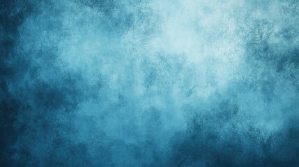 Obraz premium A serene abstract background featuring shades of blue with a textured, cloudy effect.