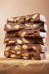 Closeup shot of stacked chocolate bars or turron bars with macro texture, hero shot