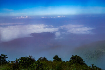 Misty mountain view scenic landscape nature photography cloudy environment elevated perspective serenity and beauty