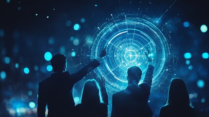 Silhouettes of business people pointing at a glowing futuristic display.