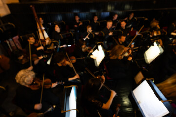 Defocused picture of orchestra in theatre