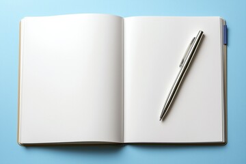 Open notebook with blank pages and silver pen on a blue background for creative writing and brainstorming activities