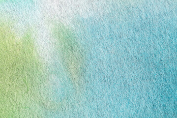 Obraz premium 淡い青色で水彩風の和紙の背景素材