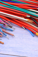 Copper electrical installation wires in colored insulation. Close-up. Soft focus.