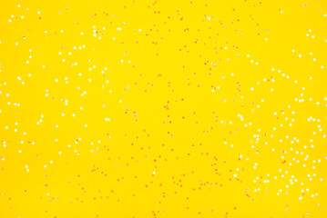 Tiny pearl stars on yellow background.