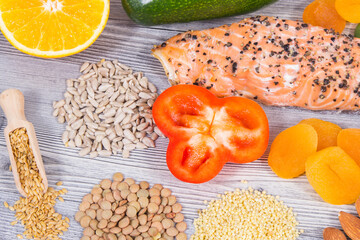 Various nutritious products or ingredients containing vitamins and minerals for healthy and lush hair