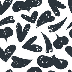 Hand-drawn childlike grunge heart seamless pattern. Old black hearts with white scratches and scuffs textured with chalk. vector art for your design, wrapping paper, packaging, wallpaper, etc