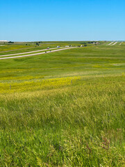 Interstate 90 through the vast open landscape in the Great Plains prairie grassland