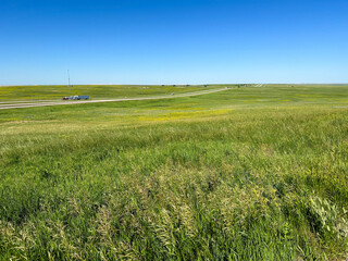 Interstate 90 through the vast open landscape in the Great Plains prairie grassland