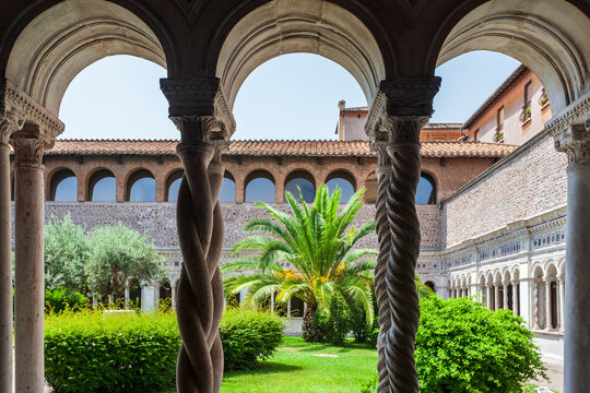 Rome, Italy, July 22 2017, Tranquil Arches of the Lateran Cloister Surrounded by Greenery in Rome