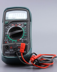 A digital multimeter for measuring the parameters of electrical circuits. Close-up. Soft focus.