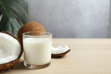 Glass of milk with coconuts on the table