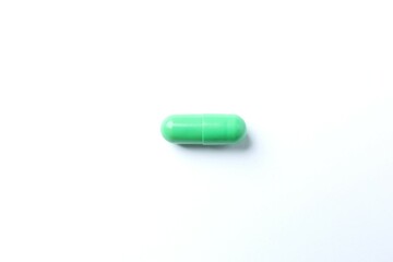 Medicine capsule on white background
