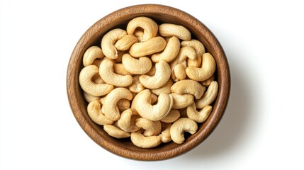 Fototapeta premium Freshly Roasted Cashews in Wooden Bowl on Isolated Background