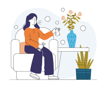 woman sneezing, orange top, sitting on chair clip art preview