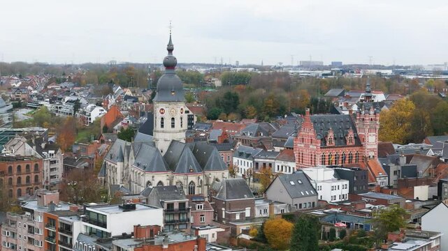 temse belgium town&rsquo;s church city hall residential areas village circling aerial drone shot view scenic river scheldt urban area european town 