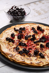 Crepes with wild cherry jam