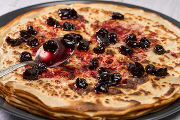 Crepes with wild cherry jam