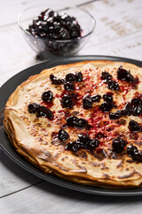 Crepes with wild cherry jam