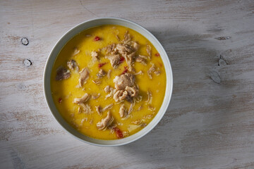 Spicy tripe soup on a wooden board