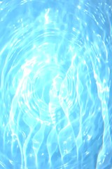 Blue water with ripples on the surface. Defocus blurred transparent blue colored clear calm water surface texture with splashes and bubbles. Water waves with shining pattern texture background.