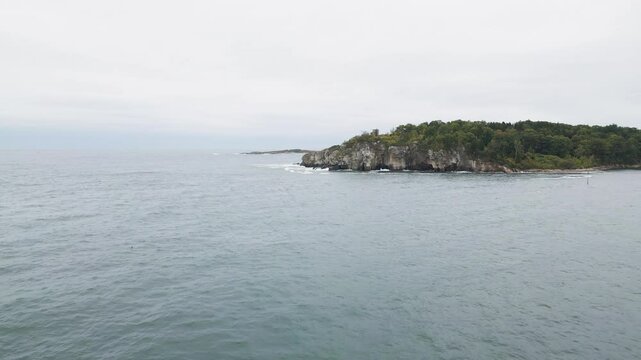 Aerial view over the water of Casco Bay with views of Cushing Island and White Head Point.