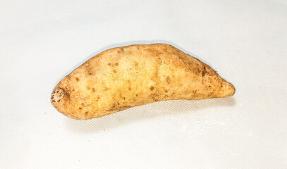 potatoes on wooden board