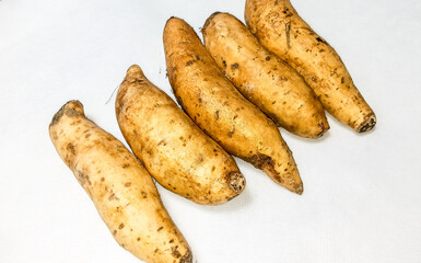 potatoes on wooden board