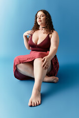 Stylish young woman in a trendy outfit sits gracefully, exuding confidence and originality.