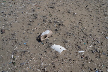 trash and pollution on a beach