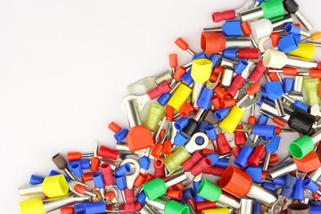 Copper pin colored insulated tips. Close-up. Soft focus.