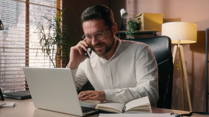 Smiling Caucasian man glad executive male guy agent talk mobile phone negotiation with client...