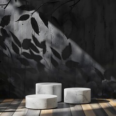 A minimalist setting featuring three marble-like stools with shadows on a dark wall.