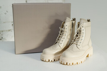 Women's leather boots in a branded box. NEW women's shoes