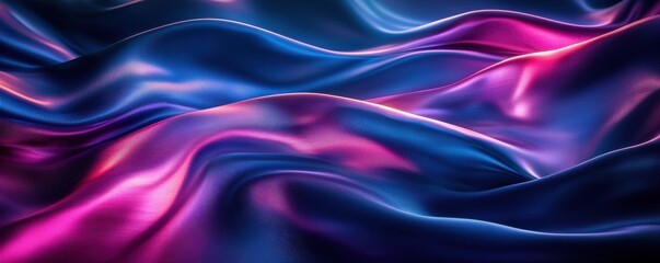 Obraz premium A vibrant, flowing fabric with rich blue and pink hues, creating a sense of depth and movement.