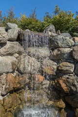 Krasnodar Park or Galitsky Park. Large wild man-made waterfall Otaki. Water falls from height of 7 meters into rocky bed of artificial river flowing into Mirror Lake. Krasnodar 