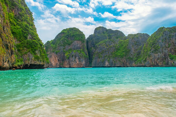 Maya Bay tropical sandy beach with turquoise water ocean on Phi Phi islands, Krabi, Thailand with...
