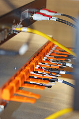Connection of electrical modules using insulated mounting wires. Close-up. Soft focus.