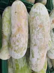 Several elephant gourds are on sale at a market in Bangkok, Thailand.