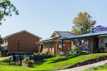 Houses in Australia decorated for Halloween with fake spiderwebs