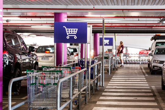 trolley return sign in undercover carpark at large shopping centre
