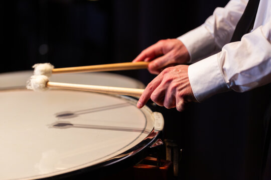 Timpani Drum being played in percussion section during concert