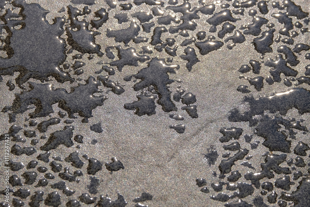 Poster abstract shapes, patterns and textures of water droplets on the floor.copy space for graphic design.