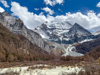 View of Tibetan sacred, holy snow mountains and hiking trail in one of the most idyllic natonal...