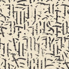 Seamless pattern of ornate Gothic letters against the background of handwritten text lorem ipsum and spot and splash. Monochrome repeating texture with ancient Latin letters scratched, dirty backdrop